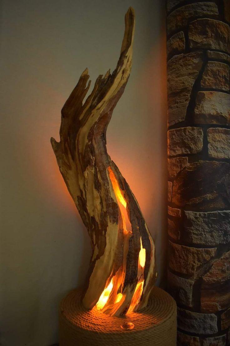 Designer wooden table lamp with turned base and warm amber glow